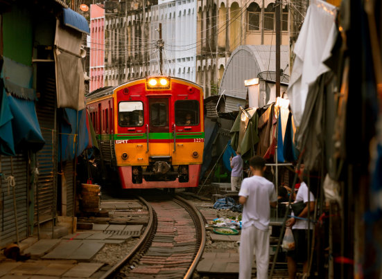 train moving across business area