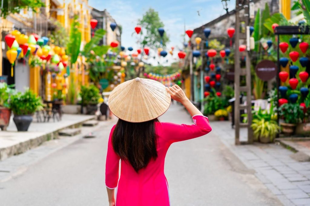 female tourist visit hoi an lantern lit old town