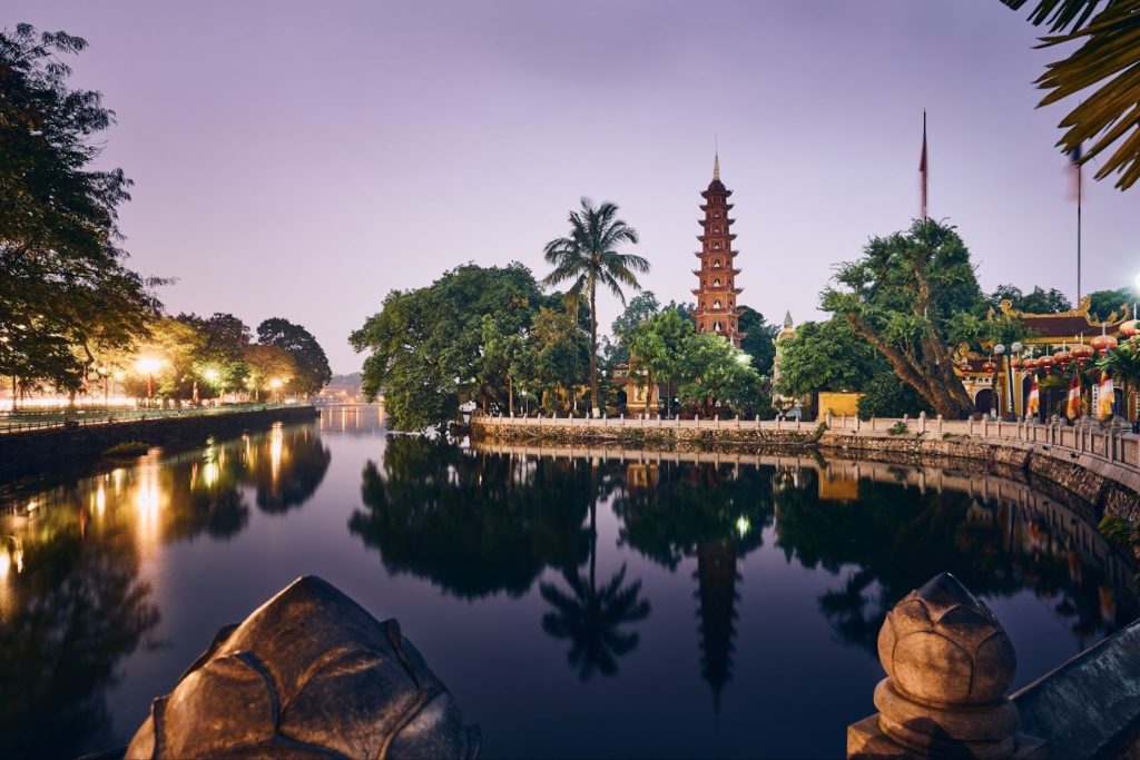 tran quoc pagoda at dusk, situated on a small island in west lake in Hanoi, Vietnam