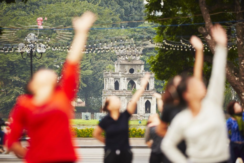 women doing outdoor calisthenics in vietnam